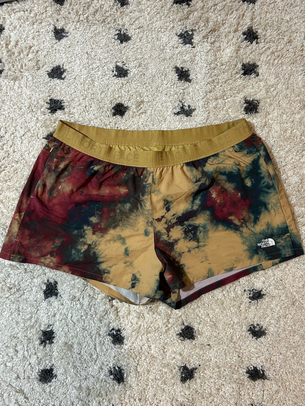 The North Face Women's Tie-Dye Athletic Shorts in Mustard, Burgundy & Green